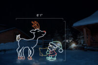 Elf Feeding Young Reindeer (5'10" H x 6'10" W)