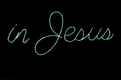 In Jesus Name sign Christmas light display