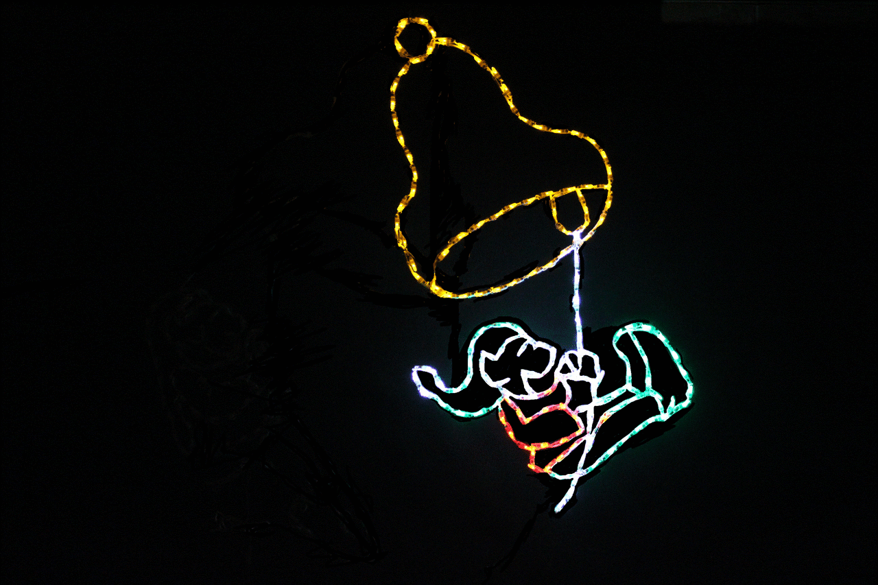Swinging elf animated Christmas light display