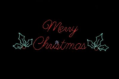 Merry Christmas sign with holly light display